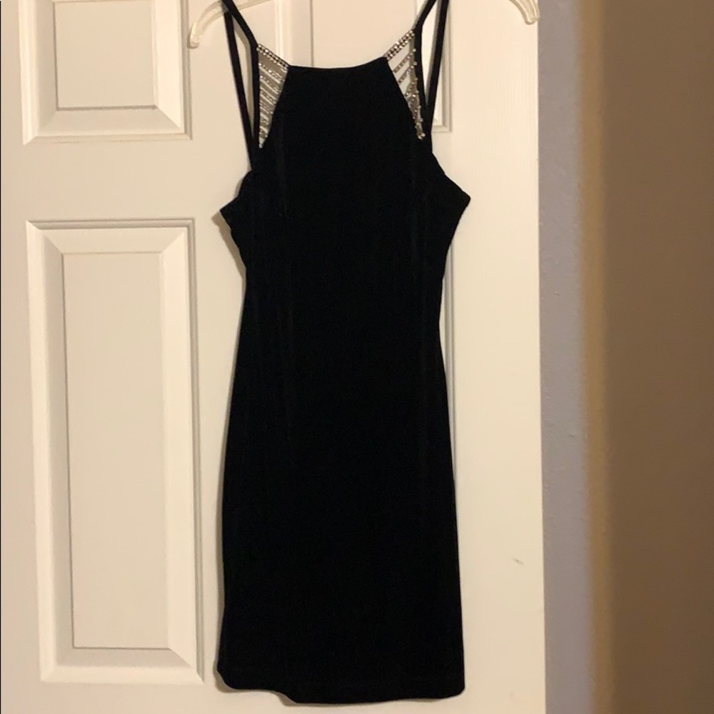 Velvet dress/stones. Size M but looks/fits like S.